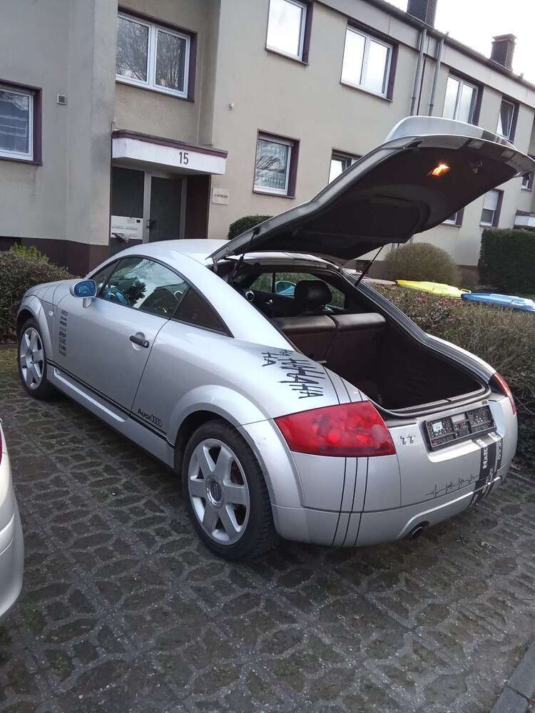 TT