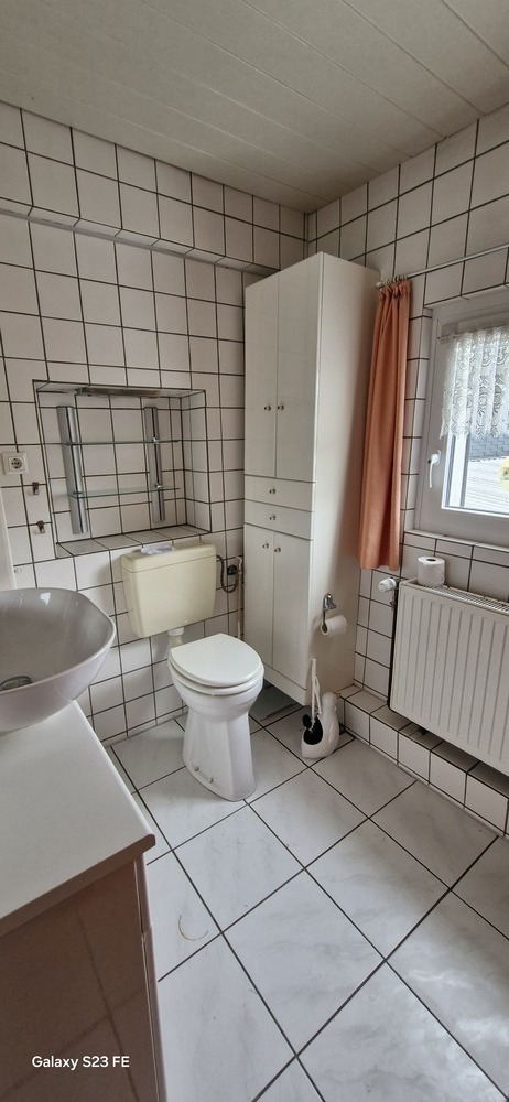 1-Fam. Haus mit Einliegerwohnung und Garagenhof zimmer