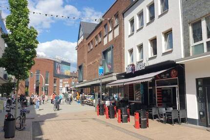 Wohn- und Geschäftshaus in Fußgängerzone, Ankermieter mit 10-Jahresvertrag zimmer