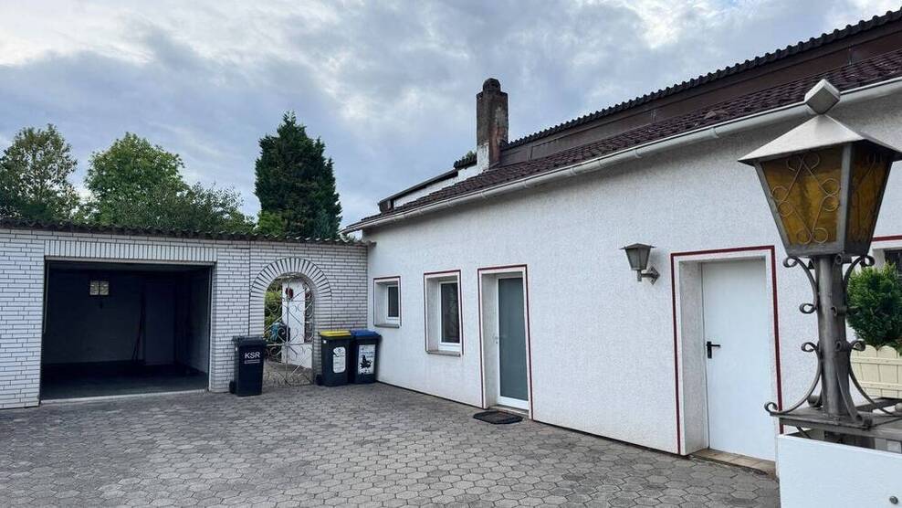 Geräumige Maisonette Eigentumswohnung mit Garten, 2 Balkonen und Garage
