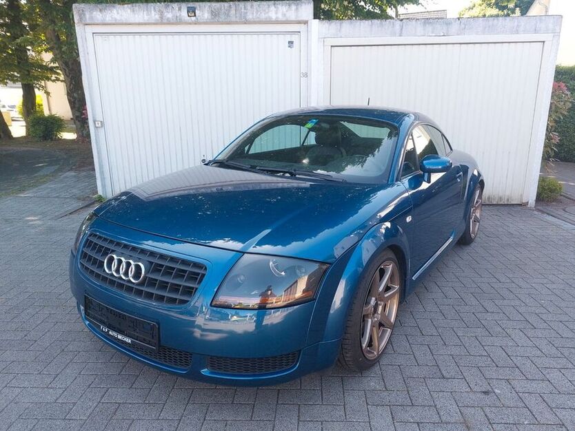 TT
