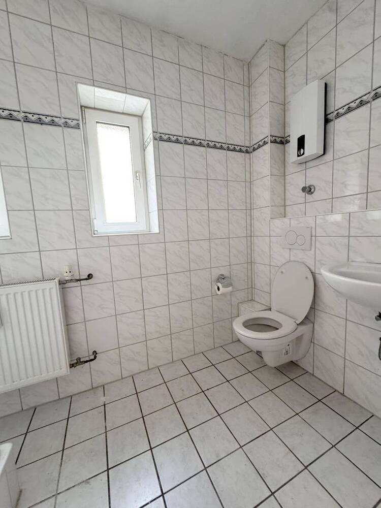 6 Wohnungen & 1 Ladenlokal. Balkone & Garagen. Liebevoll gepflegt & modernisiert.