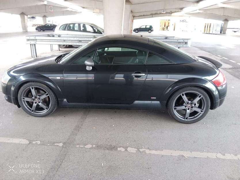 TT