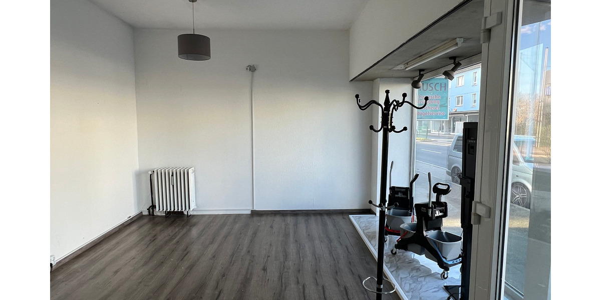 Investorenobjekt mit 3 Wohnungen, 2 Ladenlokalen und Erweiterungsmöglichkeiten 1 zimmer