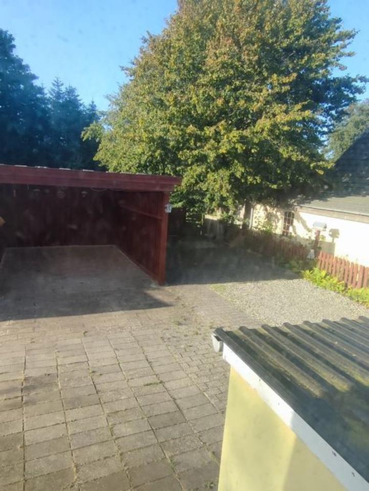 Schönes Einfamilienhaus mit großem Grunstück und Carport in DK