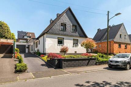 Charmante Doppelhaushälfte mit Gartenidylle, Pool und Wintergarten - ein Zuhause zum Wohlfühlen!
