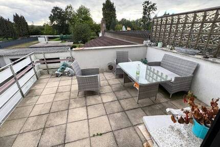 Geräumige Maisonette Eigentumswohnung mit Garten, 2 Balkonen und Garage