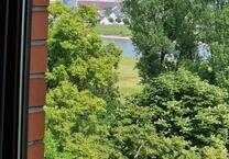 Möbliertes Penthouse mit Rheinblick & Balkon in Neuss – auf Zeit