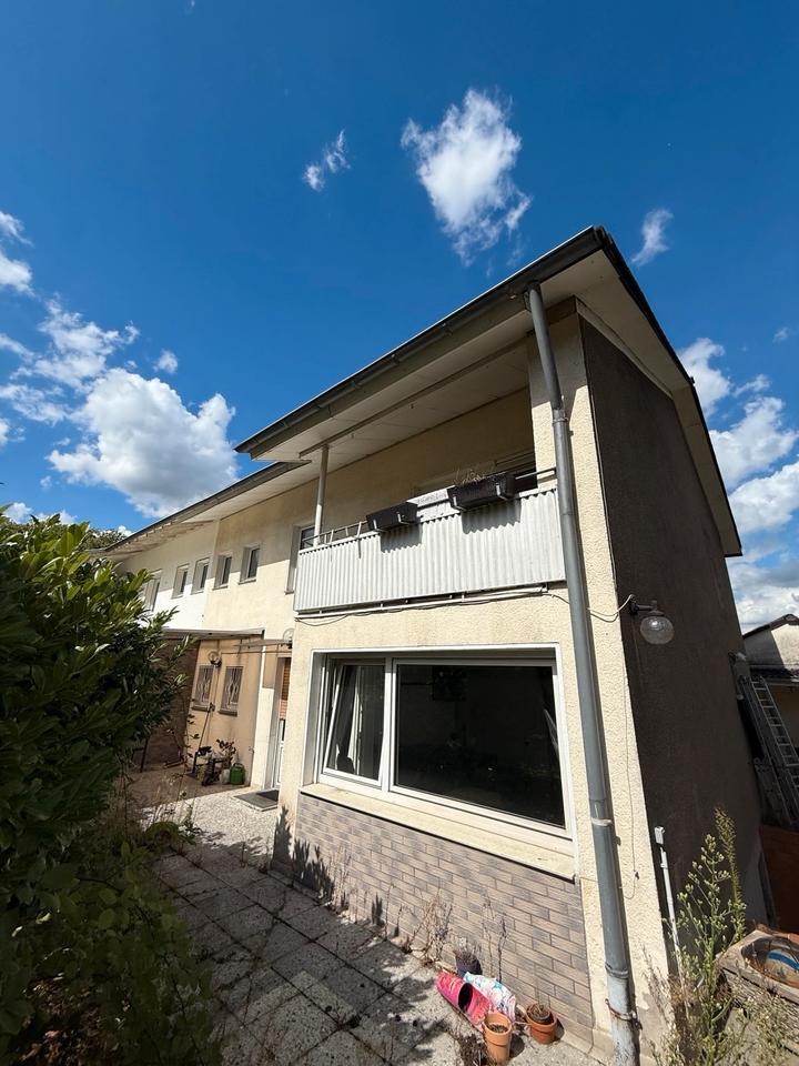 Familienfreundliches Wohnen: Haus mit Garten, Terrasse und Balkon