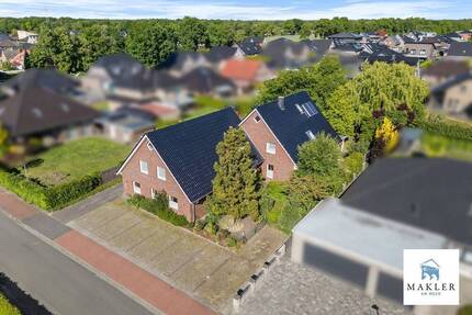 Wohnen und Arbeiten auf hohem Niveau~EFH mit vielseitig nutzbarem Praxisbereich in Westoverledingen