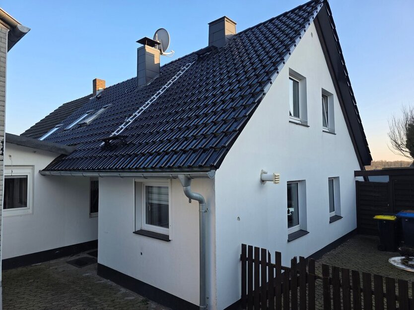 Doppelhaushälfte + Mehrfamilienhaus in 42549 Velbert