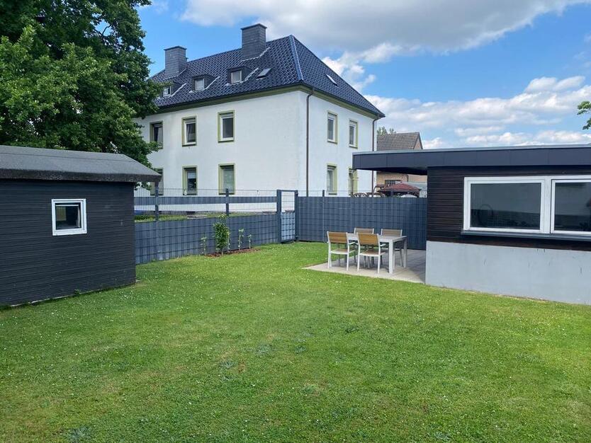 Charmante 3-Zimmer-Wohnung mit Garten, Mansarde und Stellplatz