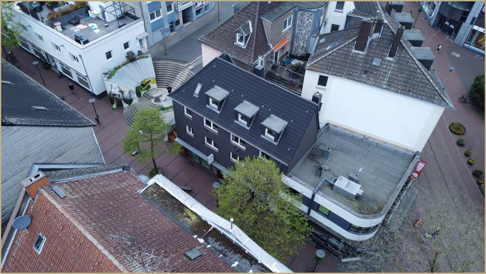 Mehrfamilienhaus mit Gewerbeeinheit – attraktive Kapitalanlage in zentraler Lage zimmer